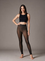 Ines sheer fleece-lined tights in dark coffee, worn with a black crop top